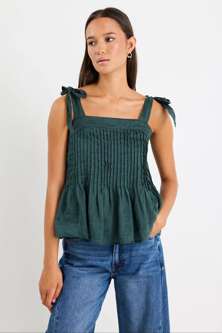 Image of a model wearing Tops. Product name - Lima Forest Ramie Tie Top in Forest colour by brand - Ivy + Jack