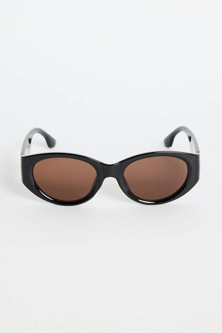 Image of Sunglasses. Product name - Tokyo Black Oval Sunglasses in Black colour by brand - Among the Brave