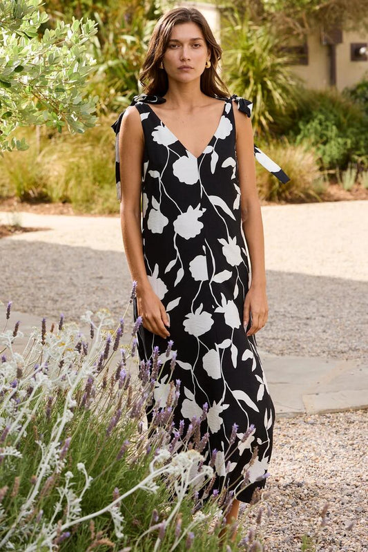 Image of Dresses. Product name - Spontaneous Black and White Floral Tie Shoulder Relaxed Midi Dress in Black And White Floral colour by brand - Stories be Told