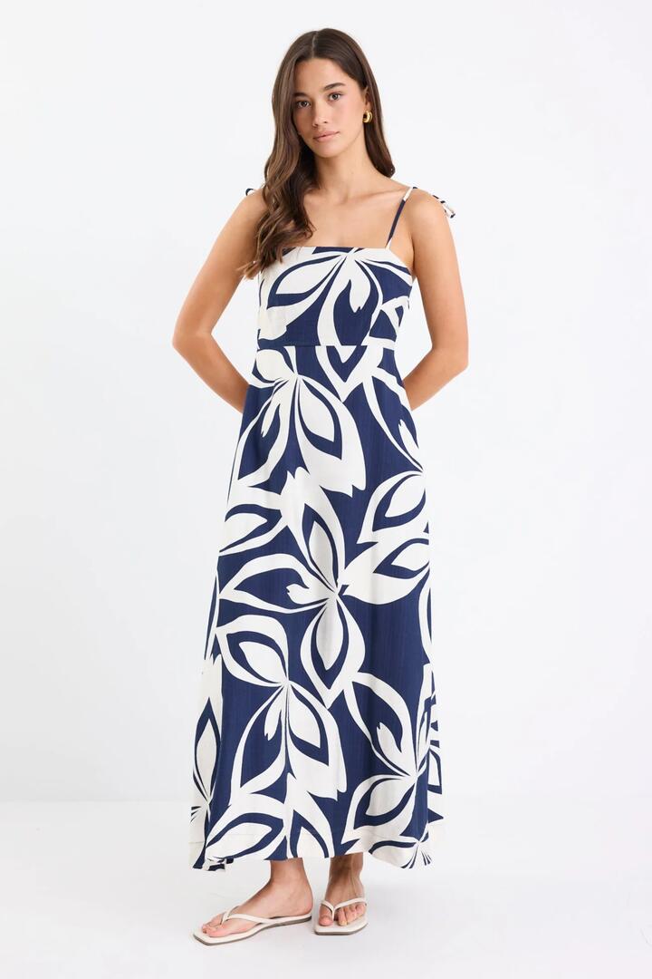 Image of Dresses. Product name - Citizen Navy Cutout Print Strappy Maxi Dress in Navy Cutout Print colour by brand - Stories be Told
