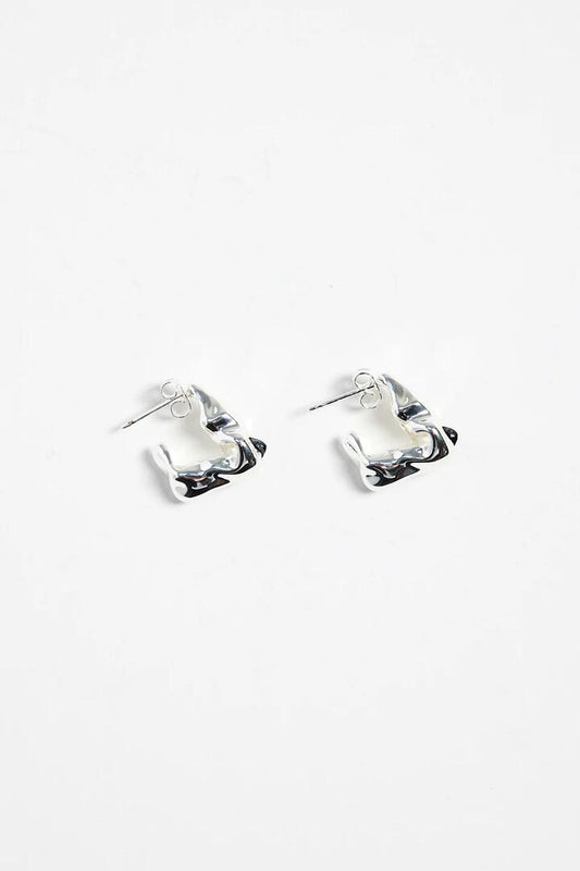 Image of Jewelry. Product name - Wavy Organic Sterling Silver Plate Huggie Earring in Silver colour by brand - Stories be Told