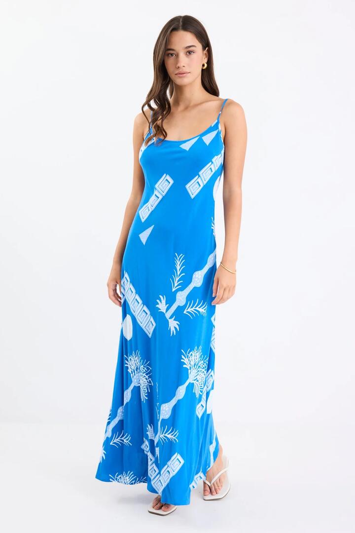 Image of Dresses. Product name - Artesian Blue Palm Strappy Bias Slip Midi Dress in Blue Palm colour by brand - Stories be Told