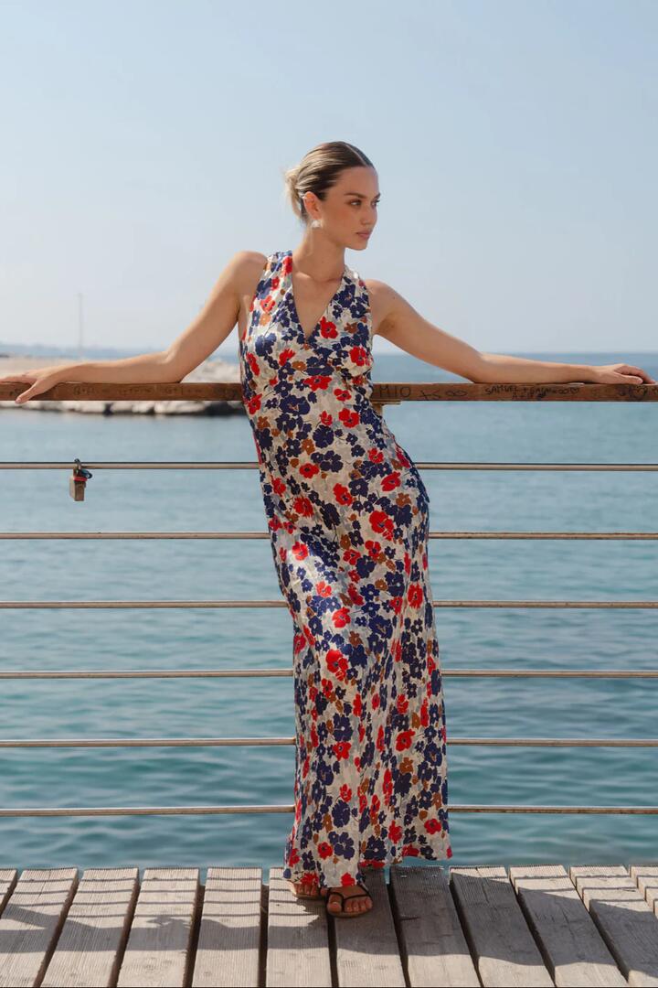 Image of Dresses. Product name - Aston Blue Red Poppy Satin Bias Flared Maxi Dress in Blue Red Poppy colour by brand - Stories be Told