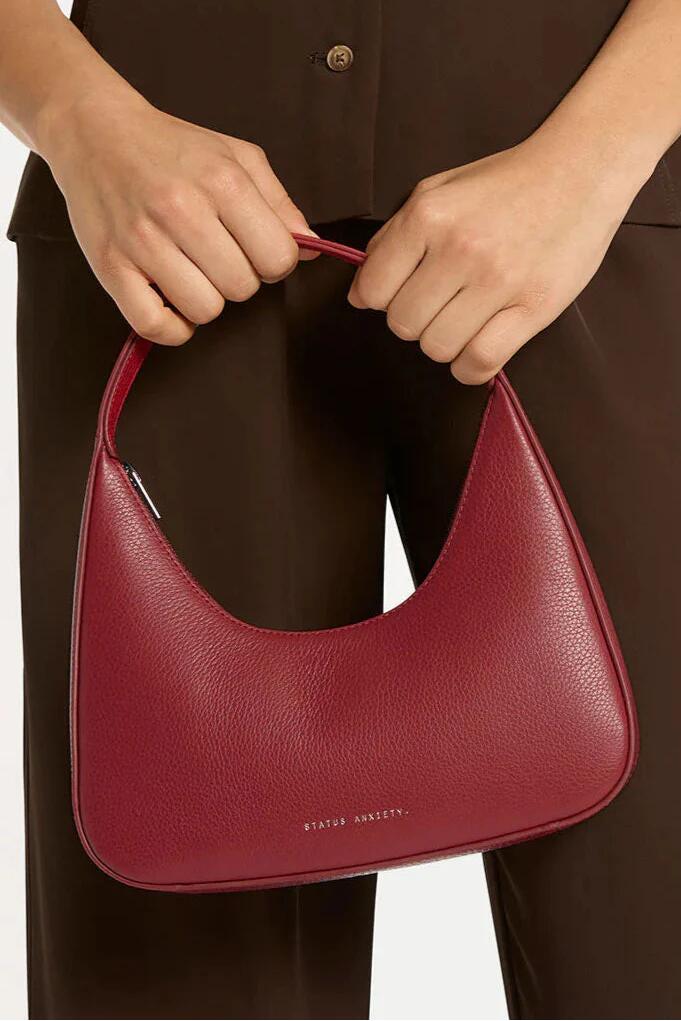 Image of Bags. Product name - Aurora Rouge Leather Structured Shoulder Bag in Red colour by brand - Status Anxiety