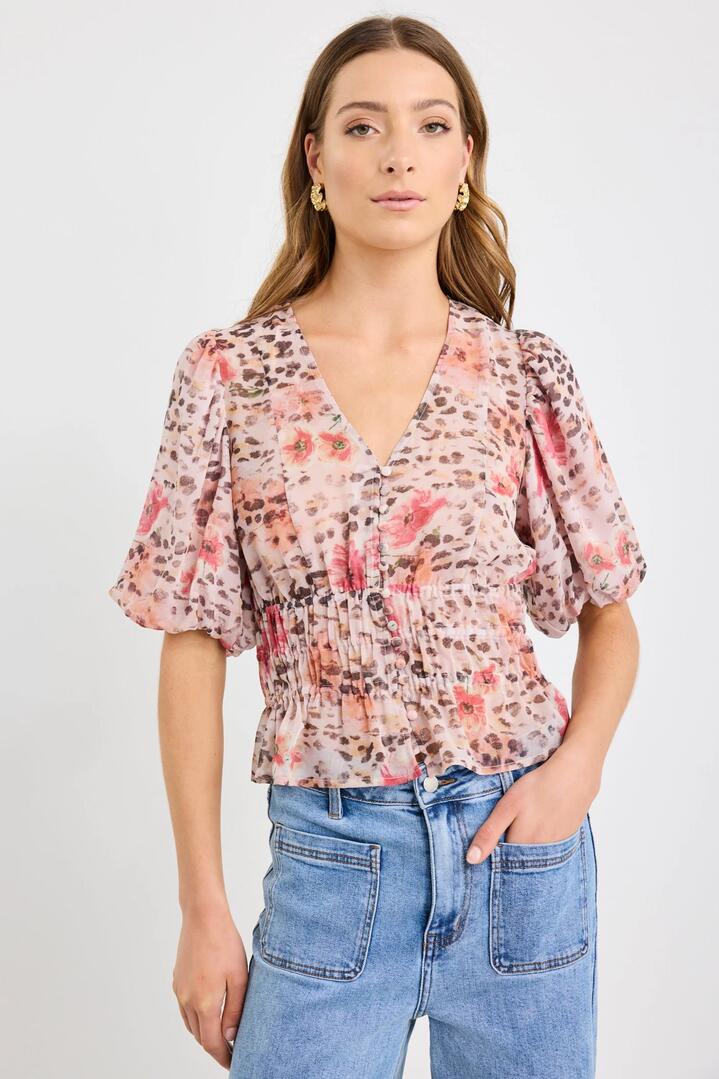 Image of a model wearing Tops. Product name - Mystery Floral Animal Bubble Sleeve SS Blouse in Floral Animal colour by brand - Stories be Told