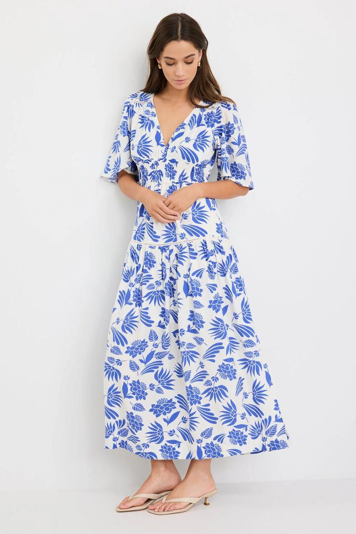 Image of Dresses. Product name - Fluent Blue Lotus Flutter Sleeve Tiered Maxi Dress in Blue Lotus colour by brand - By Rosa.