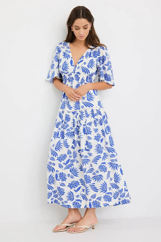 Image of Dresses. Product name - Fluent Blue Lotus Flutter Sleeve Tiered Maxi Dress in Blue Lotus colour by brand - By Rosa.