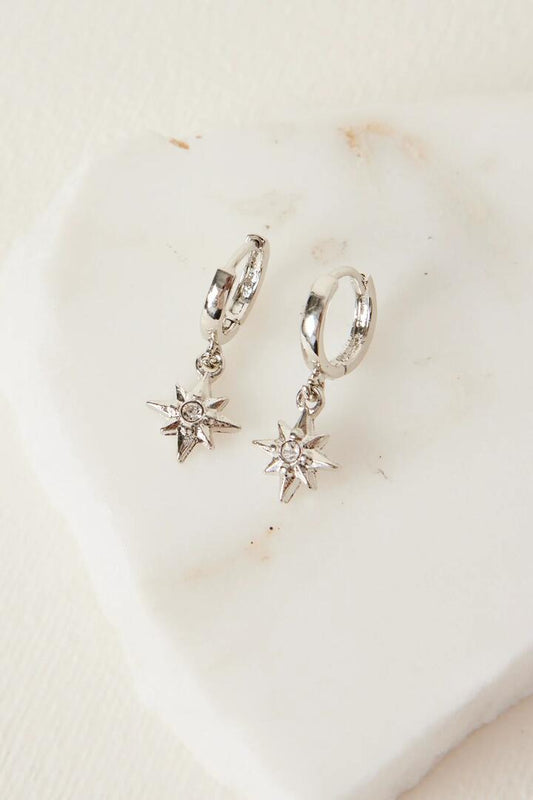 Image of Jewelry. Product name - Stardust Pendant Rhodium Huggie Earrings in Silver colour by brand - Humble + Heart