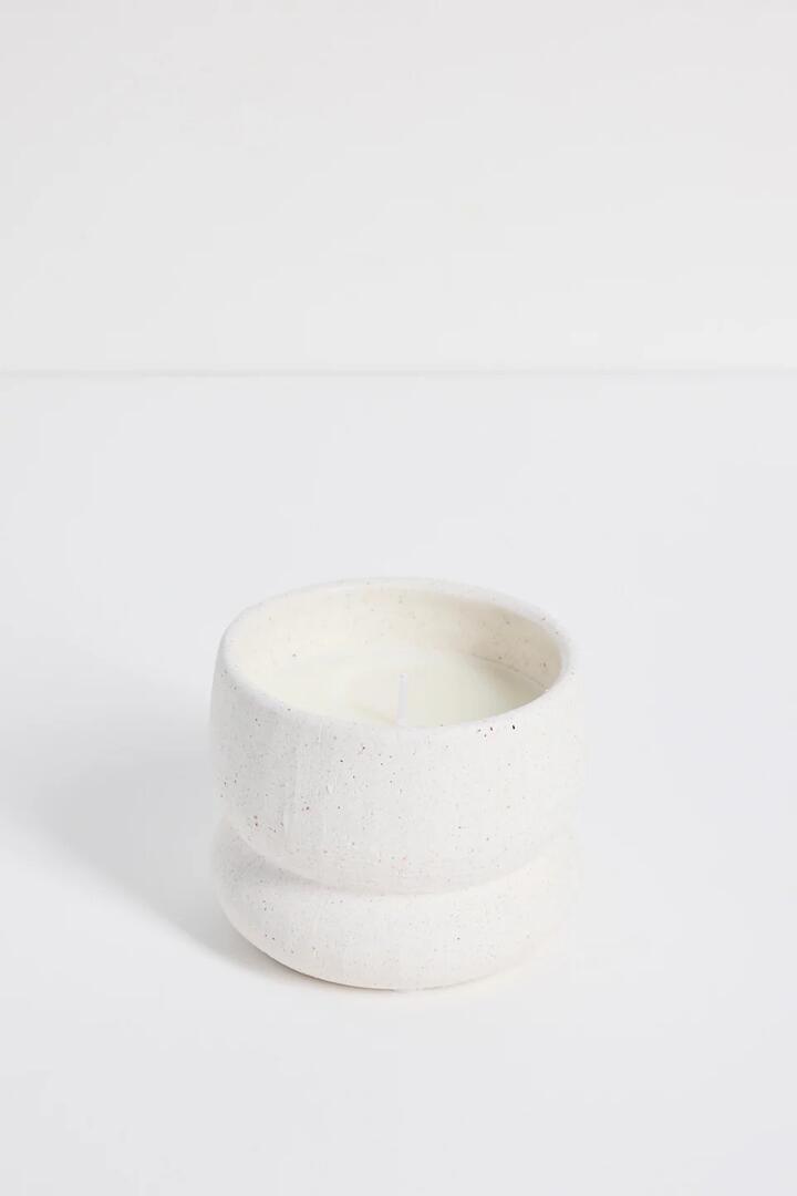 Image of Perfumes & Colognes. Product name - Ivory Textured Stone Soy Wax Candle in Stone colour by brand - Flo's Home