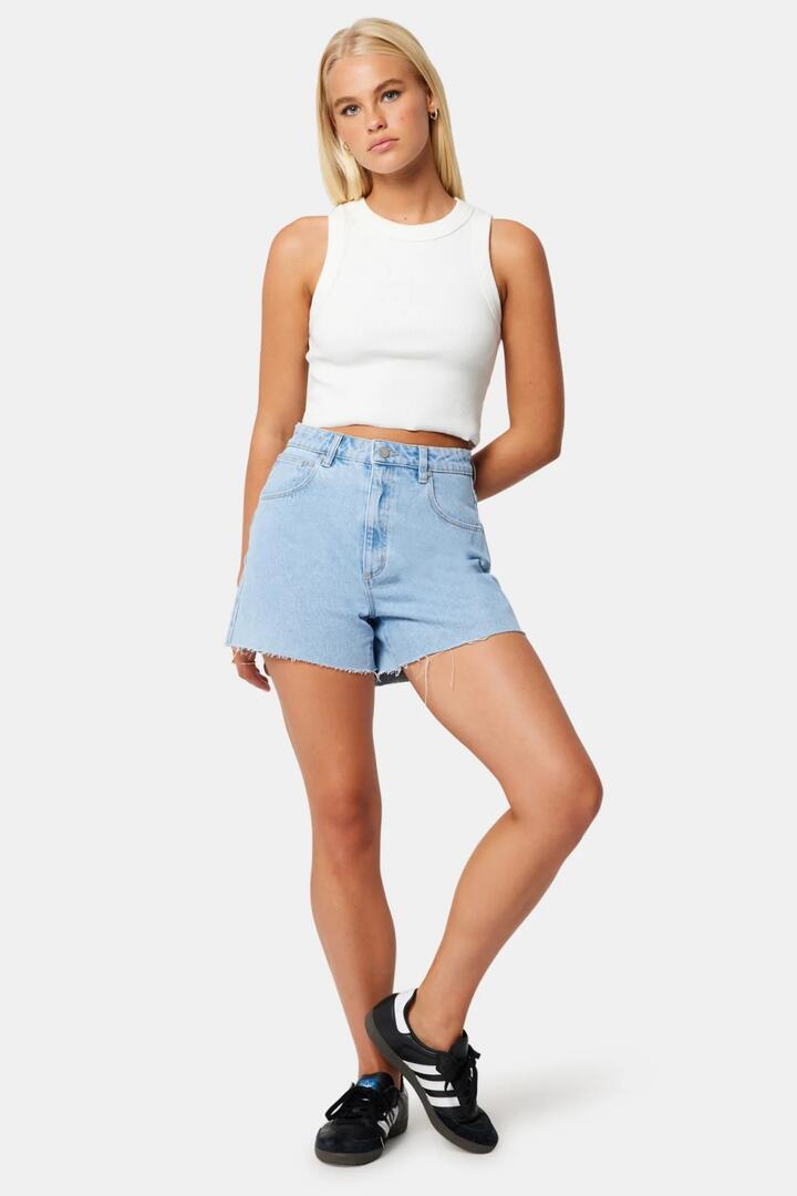 Image of a model wearing Shorts. Product name - Venice Kendall Blue Cut Off Denim Short in Blue colour by brand - Abrand Jeans
