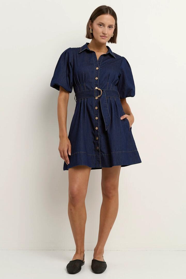 Image of Dresses. Product name - Sundown Indigo Denim Puff Sleeve Mini Shirt Dress in Indigo colour by brand - Among the Brave