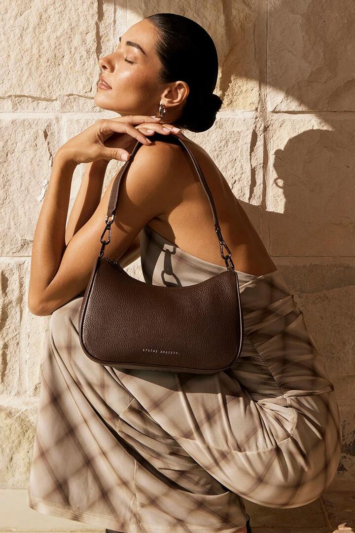 Image of Bags. Product name - Look Both Ways Cocoa Crossbody Bag in Brown colour by brand - Status Anxiety