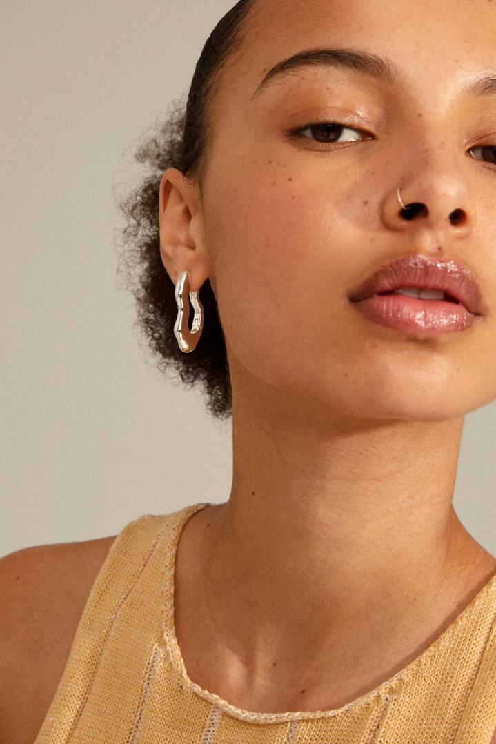 Image of Jewelry. Product name - Loulia Wavy EOL Silver Recycled Hoop Earrings in Silver colour by brand - Pilgrim