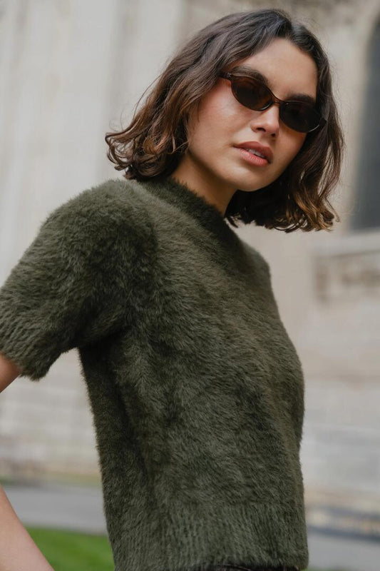 Image of a model wearing Outerwear. Product name - Issue Khaki Fluffy Soft Knit Tee in Khaki colour by brand - Ivy + Jack