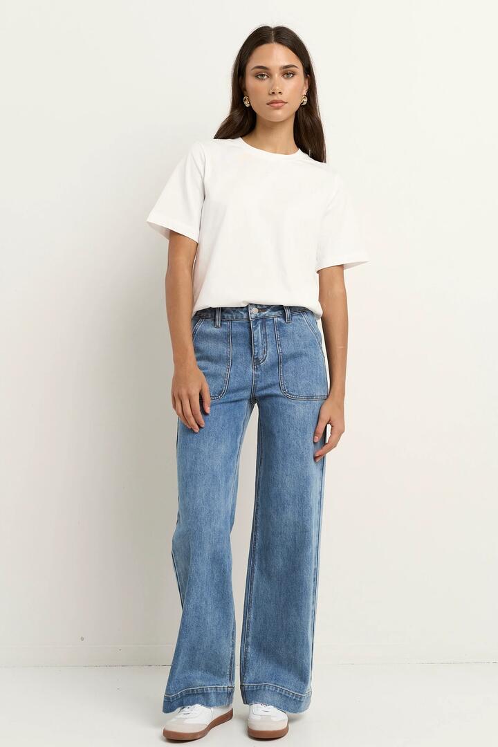 Image of Jeans. Product name - Feature Signature Blue Mid Rise Front Pocket Wide Leg Jean in Signature Blue colour by brand - Ivy + Jack