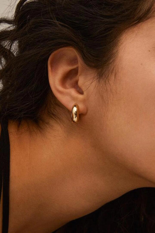 Image of Jewelry. Product name - Mine Recycled Chunky Huggie Hoops Gold in Gold colour by brand - Pilgrim