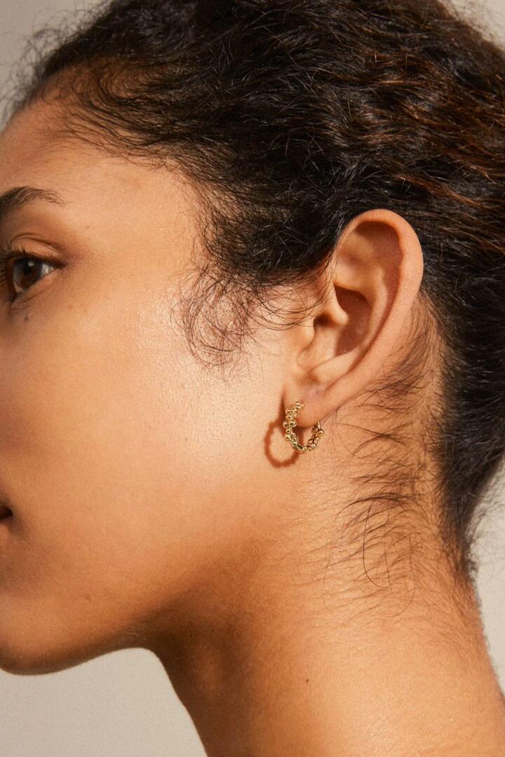 Image of Jewelry. Product name - Solidarity Recycled Small Bubbles Hoop Earrings Gold in Gold colour by brand - Pilgrim