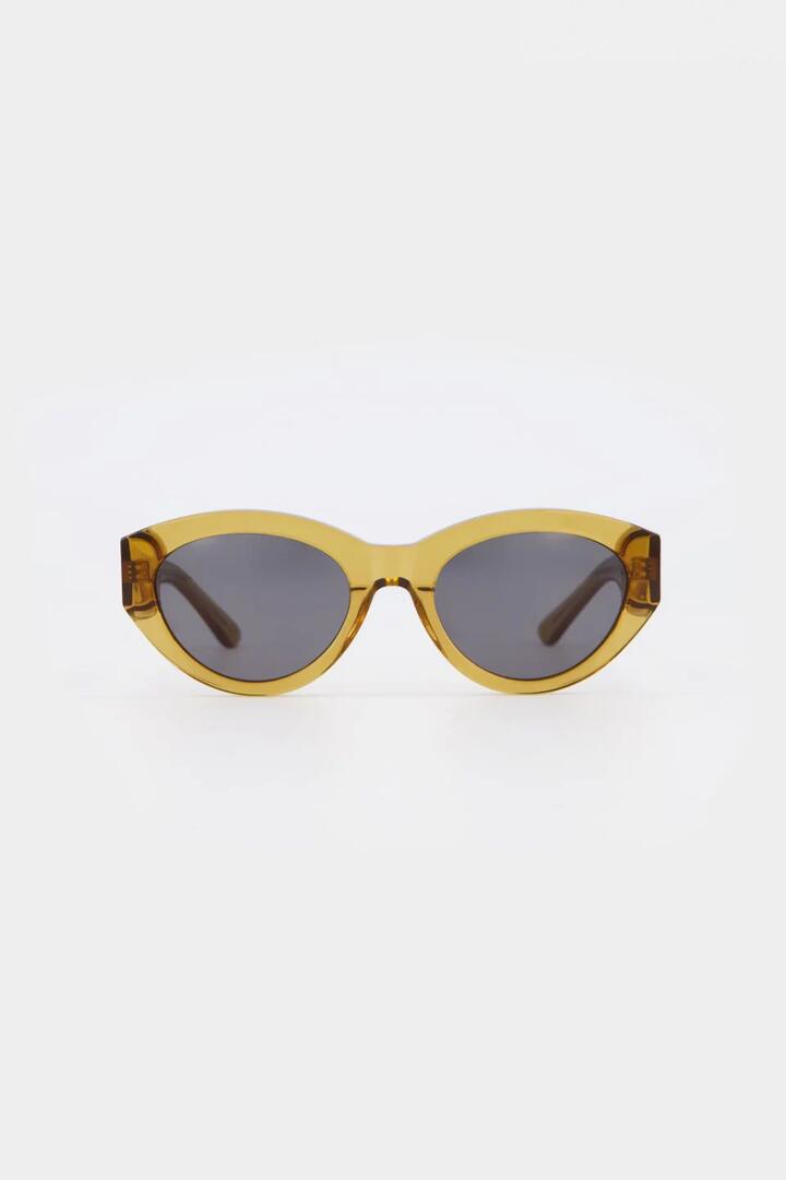 Image of Sunglasses. Product name - Felina Cognac Oval Sunglasses in colour by brand - Isle of Eden