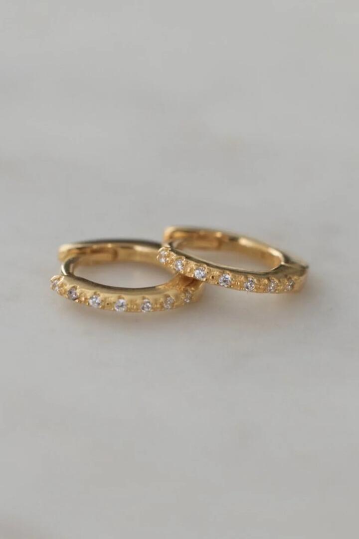 Image of Jewelry. Product name - Mini Rock Huggies Earrings Clear Gold in Gold colour by brand - Sophie