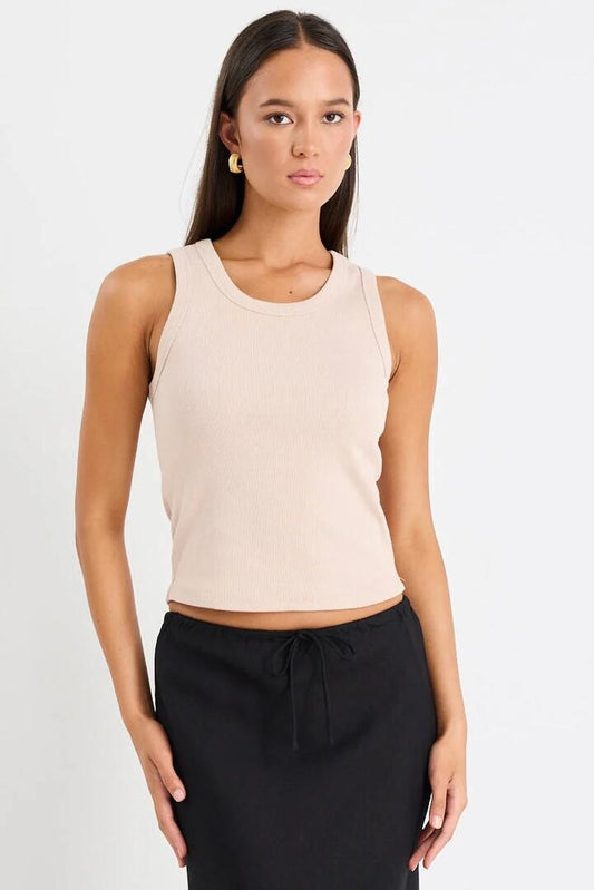 Image of a model wearing Tops. Product name - Cobble Taupe Rib Cutaway Tank in Taupe colour by brand - RE:UNION Label