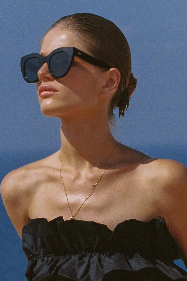 Image of Sunglasses. Product name - Air Heart Cat Eye Black Gold Khaki Lens Sunglasses in Black colour by brand - Le Specs