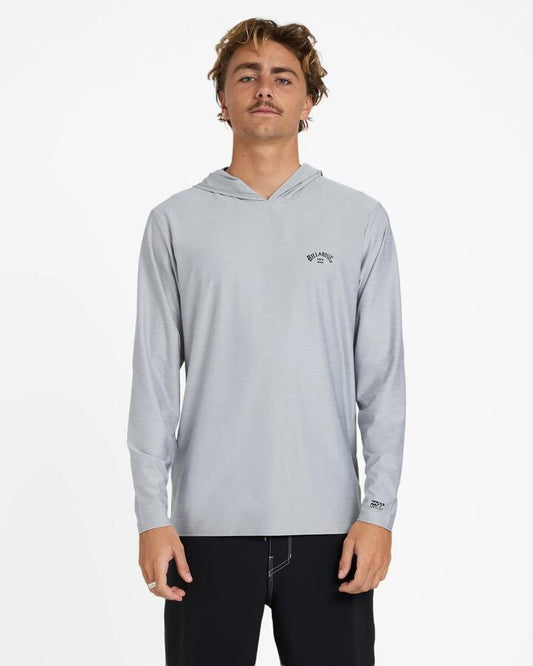 Image of a model wearing Tops. Product name - Billabong Mens Shoreline Lf Hooded Long Sleeve Rash Vest Light Grey Heather in Light Grey Heather colour by brand - Billabong