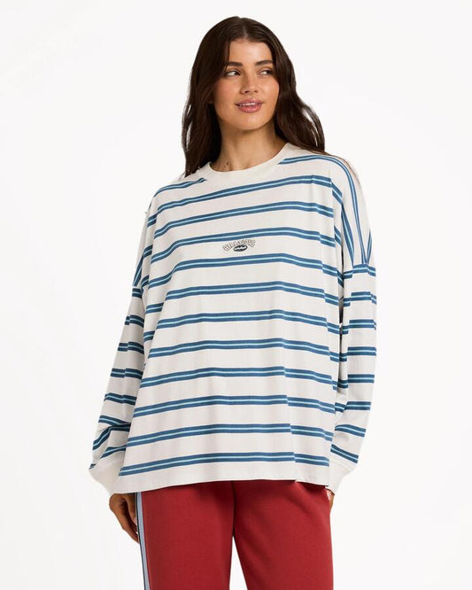Image of a model wearing Tops. Product name - Billabong Womens Original Tides Long Sleeve T-Shirt Salt Crystal in Salt Crystal colour by brand - Billabong