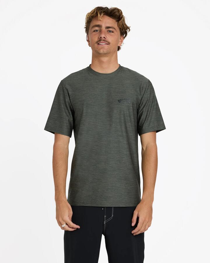 Image of a model wearing Tops. Product name - Billabong Mens Shoreline Lf Short Sleeve Surf Shirt Military Heather in Military Heather colour by brand - Billabong