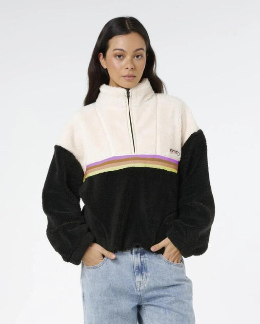 Image of a model wearing Outerwear. Product name - Rip Curl Womens Surf Revival Polar Fleece Jumper Washed Black Rainbow in Washed Black Rainbow colour by brand - Rip Curl