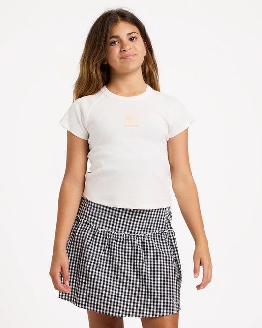 Image of a model wearing Skirts. Product name - Billabong Girls 6-16 Gingham Crush Mini Skirt Black White in Black White colour by brand - Billabong