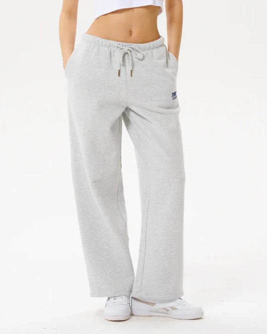 Image of a model wearing Pants. Product name - Rip Curl Womens Surf Puff Wide Leg Trackpants Grey Marle/Navy in Grey Marle/Navy colour by brand - Rip Curl