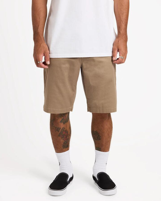 Image of a model wearing Shorts. Product name - Volcom Mens Frickin Modern Shorts Khaki in Khaki colour by brand - Volcom