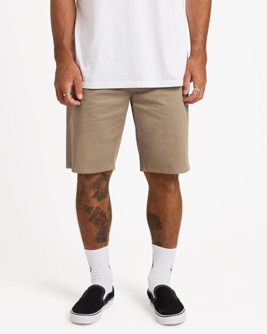 Image of a model wearing Shorts. Product name - Volcom Mens Solver Lite 5 Pocket 19" Walkshorts Brindle in Brindle colour by brand - Volcom