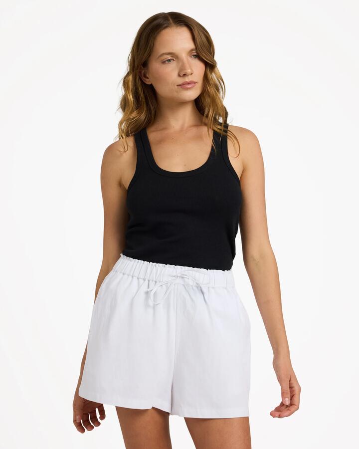 Image of a model wearing Shorts. Product name - Roxy Womens Place To Be Linen Shorts White in White colour by brand - Roxy
