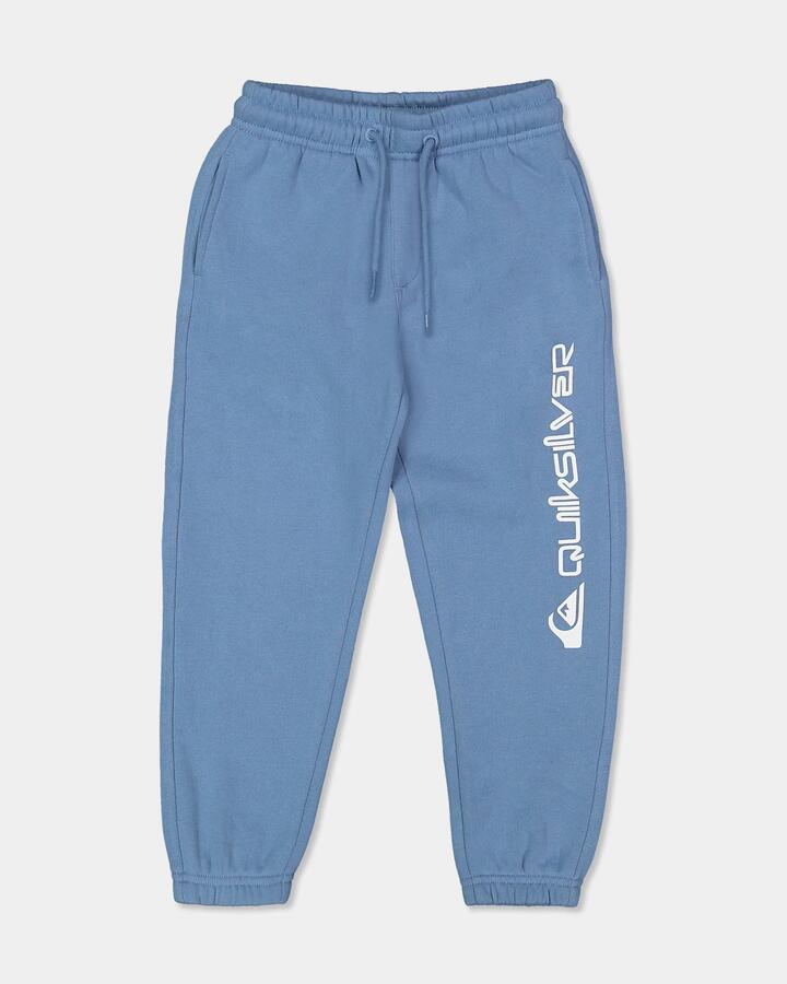 Image of a model wearing Pants. Product name - Quiksilver Boys 2-7 Screen Trackpants Riviera in Riviera colour by brand - Quiksilver