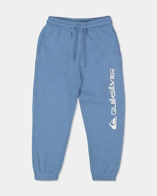 Image of a model wearing Pants. Product name - Quiksilver Boys 2-7 Screen Trackpants Riviera in Riviera colour by brand - Quiksilver