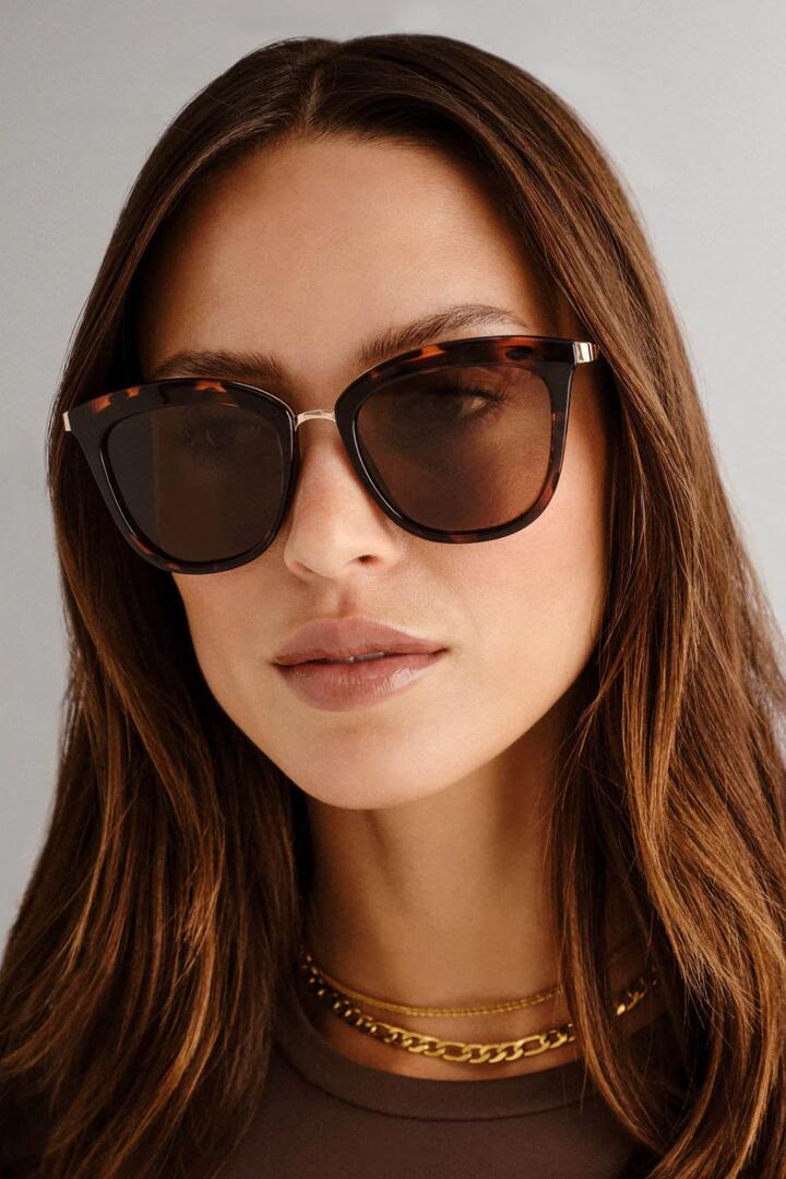 Image of Sunglasses. Product name - Caliente Tort Gold Arms Brown Polarised Lens Sunglasses in Brown colour by brand - Le Specs