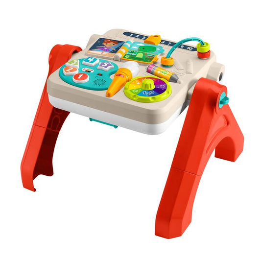Image of a model wearing Tops. Product name - Fisher-Price Laugh & Learn 4-in-1 Activity Table & Easel in colour by brand - Fisher-Price