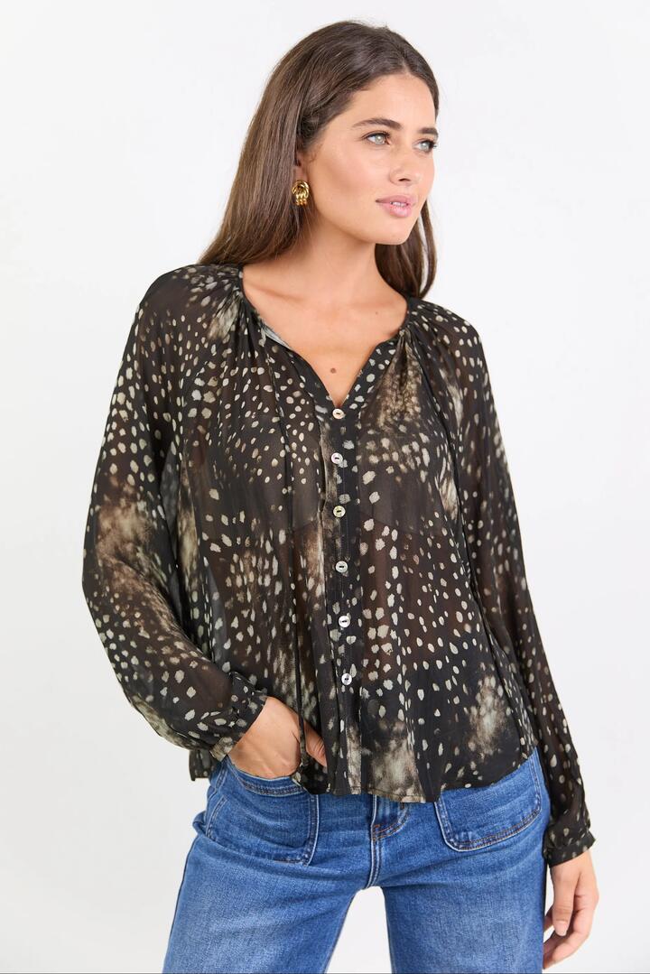 Image of a model wearing Tops. Product name - Envision Black Polka Dot Georgette Button Front LS Top in Black Polka Dot colour by brand - Stories be Told
