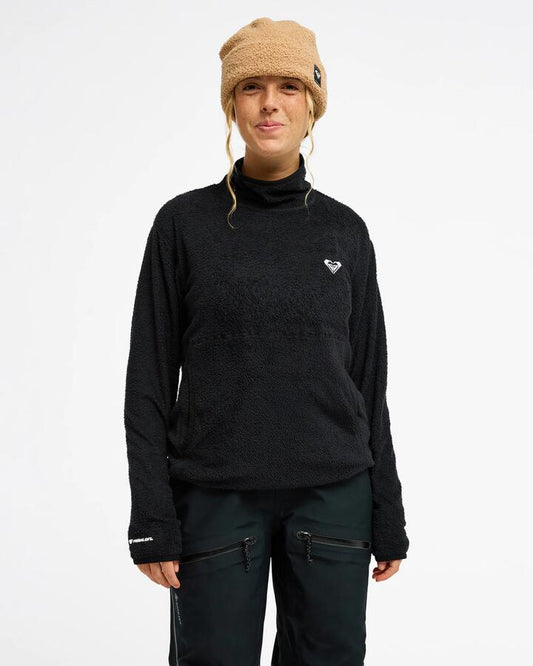 Image of a model wearing Outerwear. Product name - Roxy Womens Heat Haven Primaloft Layer Technical Fleece True Black in True Black colour by brand - Roxy