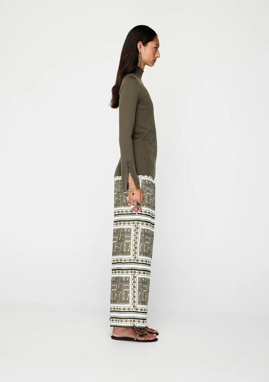Image of a model wearing Tops. Productname: Vela Knit Top | MOS The Label in Sea Kelp colour by brand - MOS The Label