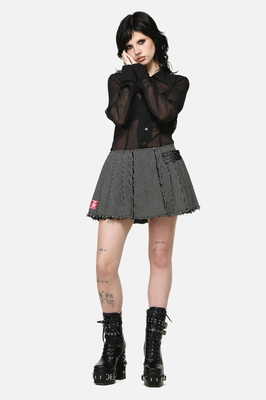 Image of a model wearing Skirts. Productname: Medusa Punk Skort in Black colour by brand - Dangerfield