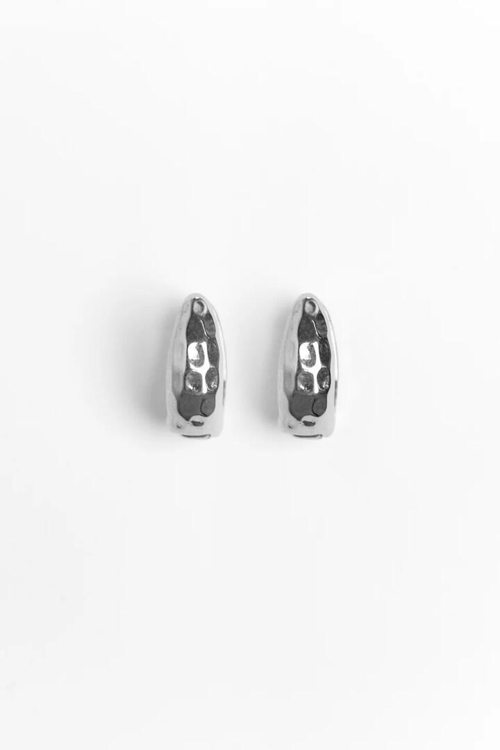 Image of Jewelry. Product name - Chunky Hammered Oval Rhodium Earrings in colour by brand - Humble + Heart