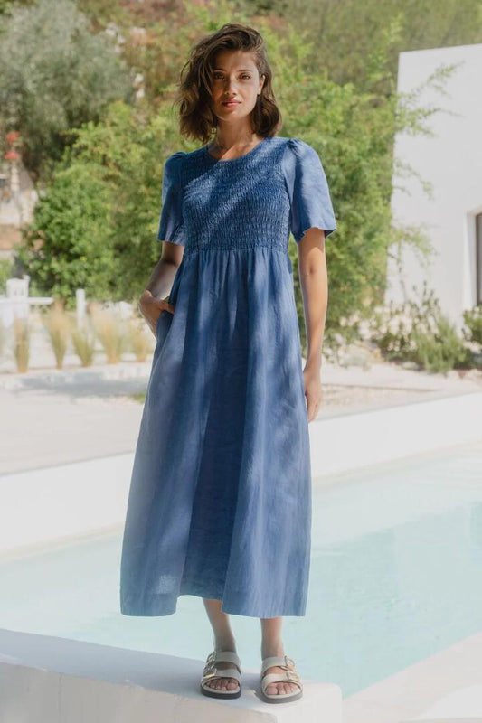 Image of Dresses. Product name - Wren Cornflower Blue Linen SS Shirred Bodice Midi Dress in Cornflower Blue colour by brand - RE:UNION Label