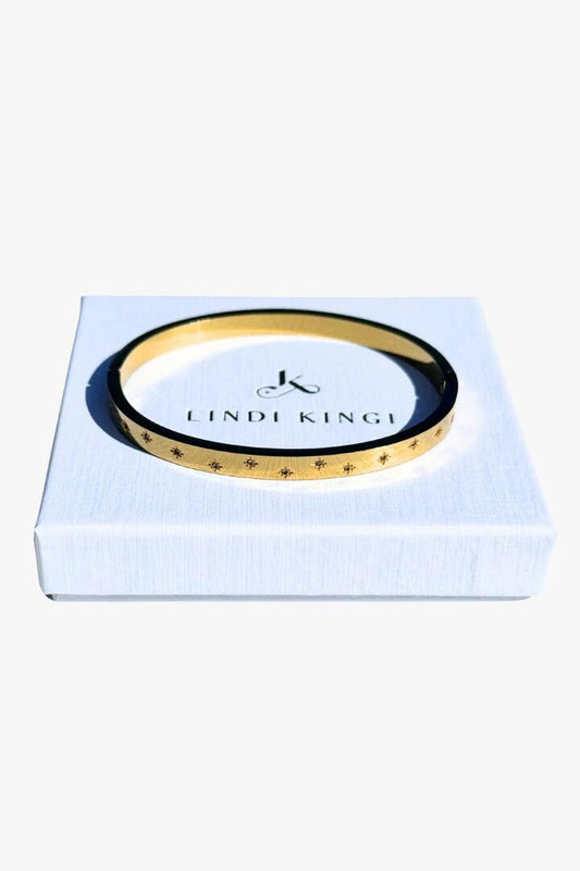 Image of Jewelry. Product name - Vogue Gold Bangle in Gold colour by brand - Lindi Kingi
