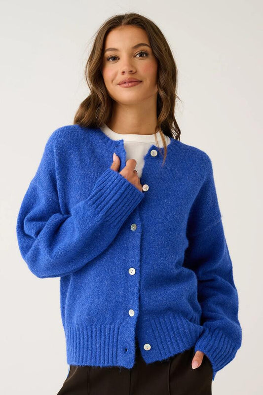 Image of a model wearing Outerwear. Product name - Aurora Cobalt Wool Blend Cardi in Blue colour by brand - Cartel & Willow