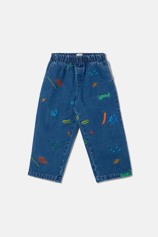 Image of a model wearing Pants. Product name - Maxi Doodles Kids Pants in Denim colour by brand - Gorman