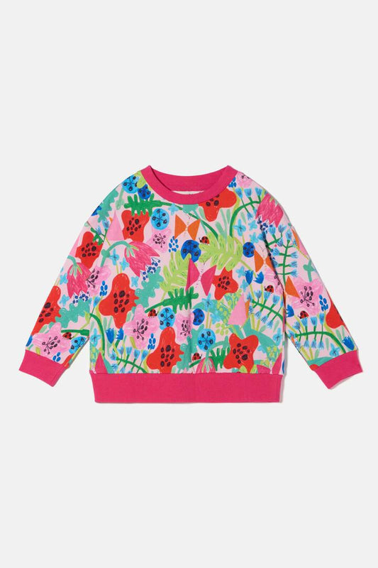 Image of a model wearing Outerwear. Product name - Flower Fields Kids Sweater in Pink colour by brand - Gorman