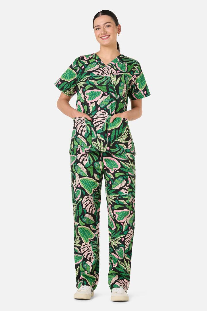 Image of a model wearing Uniforms & Workwear. Product name - Botanica Blush Scrub Set in Multi colour by brand - Gorman