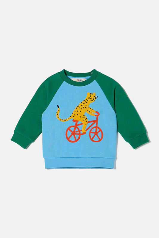 Image of a model wearing Outerwear. Product name - Leo On Bike Baby Sweater in Multi colour by brand - Gorman